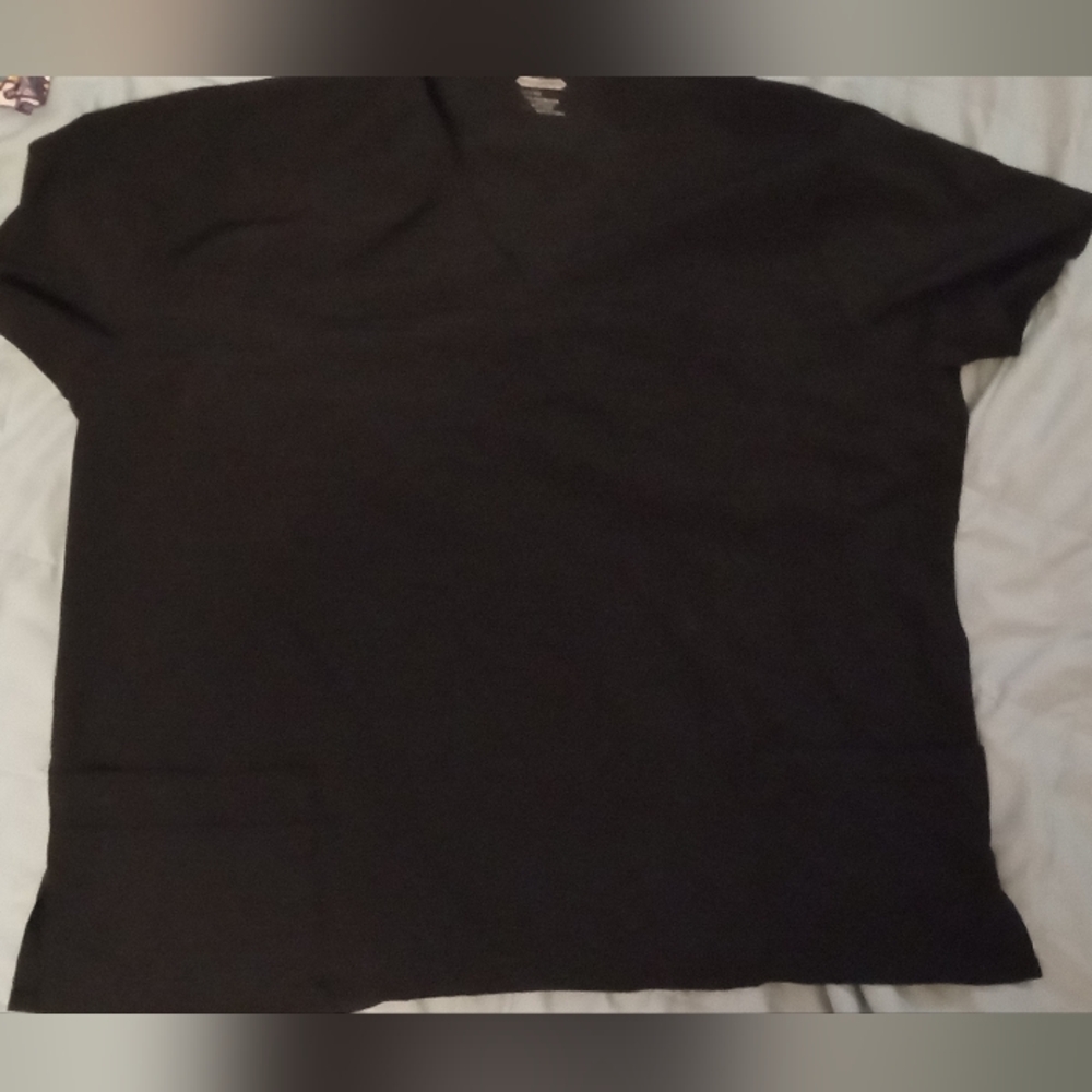 A full set of scrubs, never worn, black, shirt 2x, pants 2x